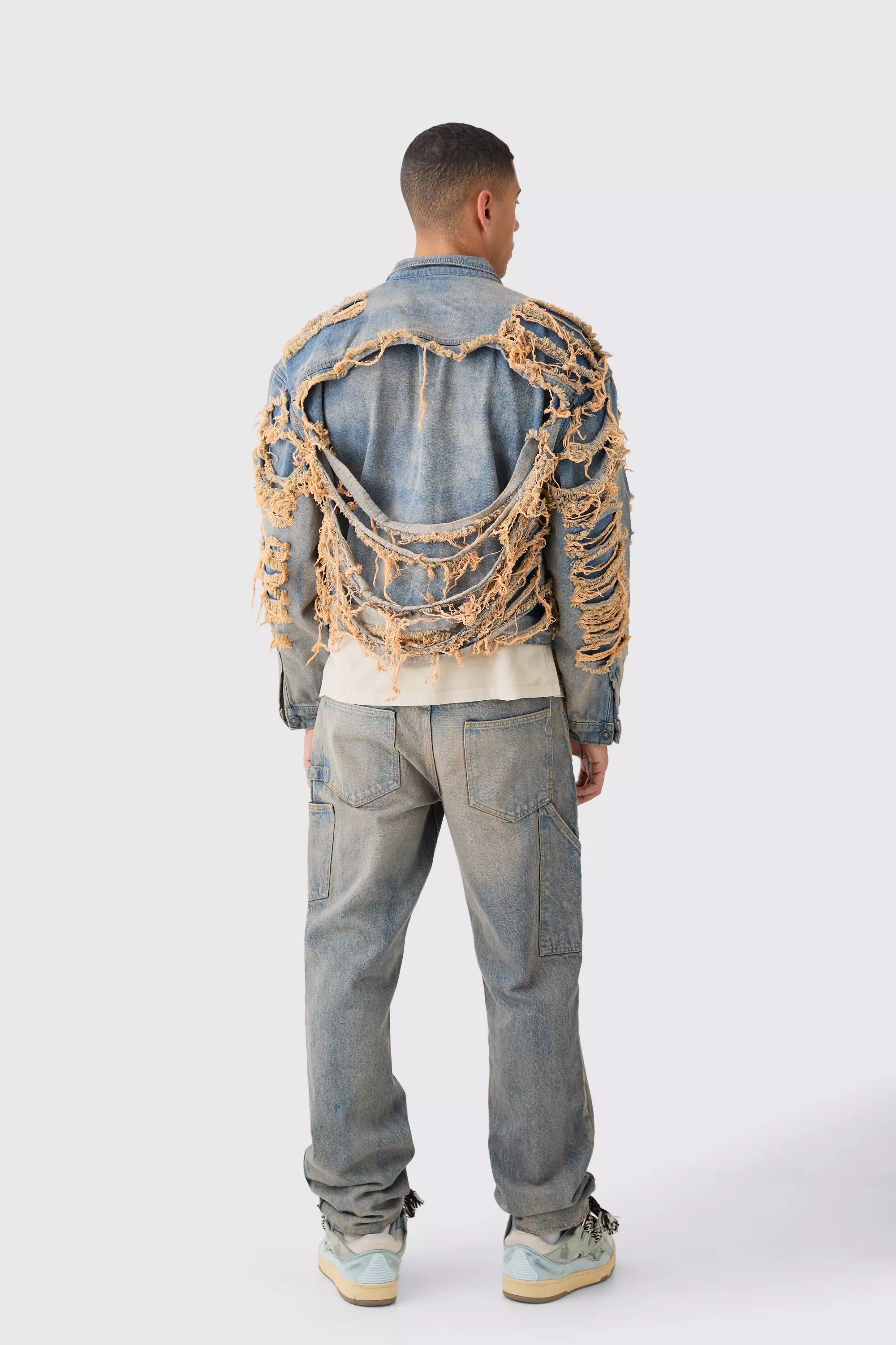 Extreme distressed sales denim jacket